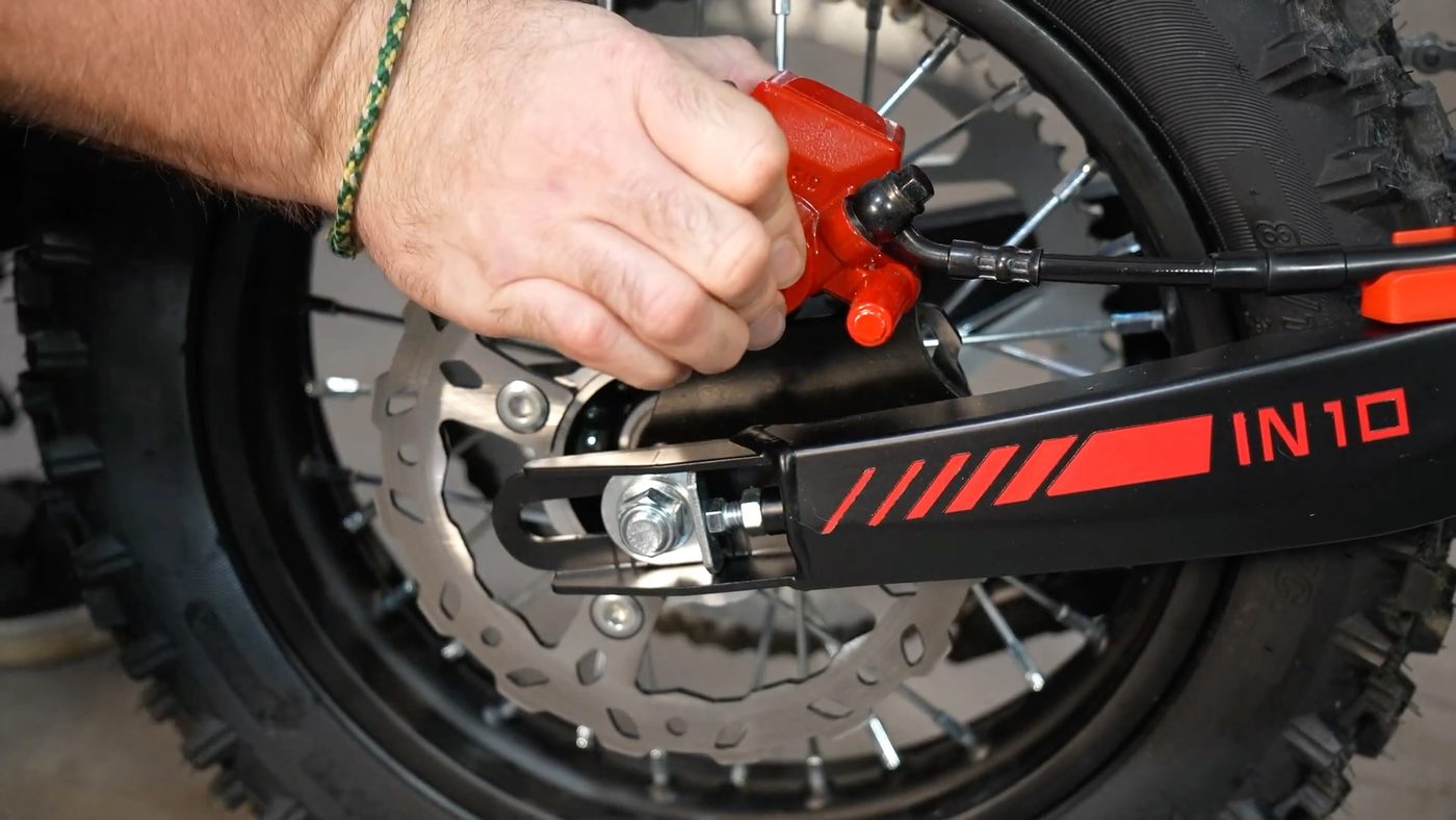Rear brake caliper and thick rotor